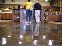 customers stand on polished concrete floor
